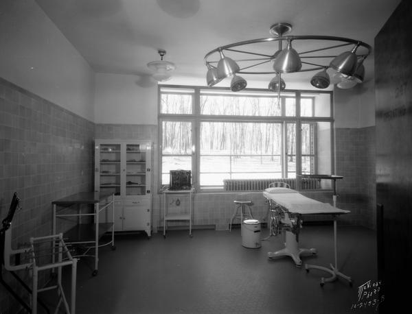 Lake View TB Sanitarium operating room. There is a large window along the back wall.