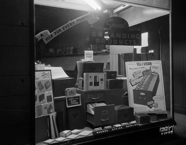 Smead's Products in Badger Office Supplies Window Badger Office Supplies, 120 West Mifflin Street, featuring a window display of Smead's files "A file for every purpose."