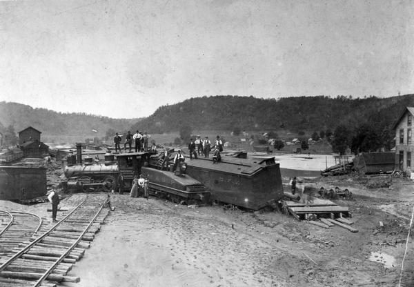Elevated view of the Kickapoo & Northern Railway locomotive and cars seen here after being derailed due to flooding on the Kickapoo River.