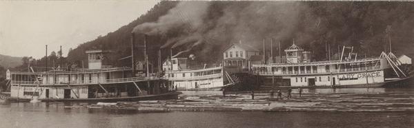 Three steamers, the "Robert Dodds," the "Stillwater," and, the "Lady Grace," transporting logs in Beef Slough.