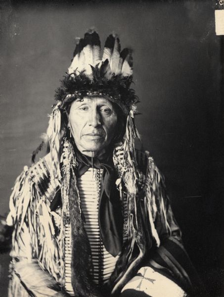 Studio portrait of Yankton Dakota man, Cetan Wakute (Shooting Hawk. Part of Siouan (Sioux) and Yankton Tribes.