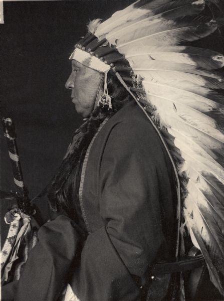 Profile portrait of Ponca man, Mi'-xa-ton-ga or Me-kon-tunga (Big Goose). Part of Siouan (Sioux) and Ponca Tribes.