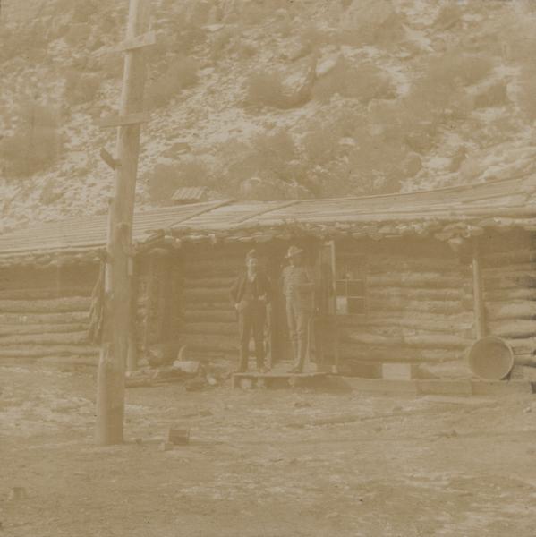 A stage station en route from the railroad to Fort Duchesne, Utah, an example of accommodations for travelers. Agent Mytor stands in the doorway.