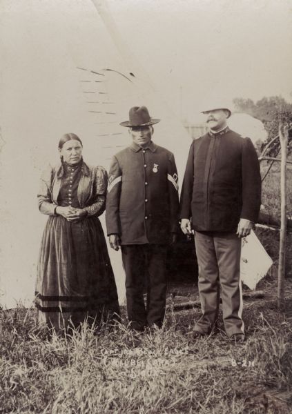 Captain Joseph Black Eagle (Waubli Sapa), Sioux, with a man and a woman at the Trans-Mississippi Exposition and Indian Congress.