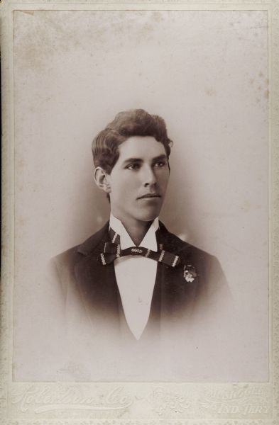Head and shoulders vignetted studio portrait of Vance McSpadden of the Cherokee High School Class of 1898.