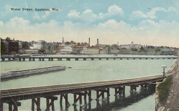 Fox River with a view of Appleton in the background. Caption reads: "Water Power, Appleton, Wis."