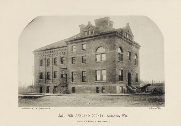 Text on front reads: "Jail For Ashland County, Ashland, Wis." and "Conover & Porter, Architects."