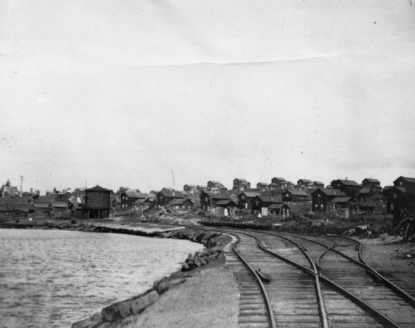 Star Lake, Arbor Vitae Township, with the railroad tracks of Chicago, Milwaukee and St. Paul Railway on right and lake on the left.