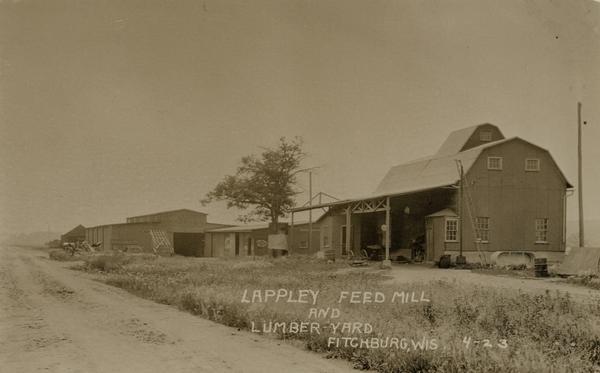 Lappley Feed Mill and lumberyard. Caption reads: "Lappley Feed Mill and Lumber Yard Fitchburg, Wis."