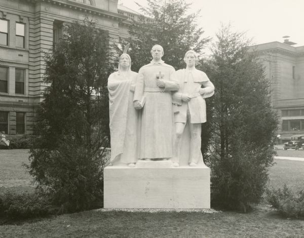 "Spirit of the Northwest" monument by Sidney Bedore, on the grounds of the Brown County Court House. Represented, left to right: a Menominee, Claude Allouez and Nicolas Perrot.