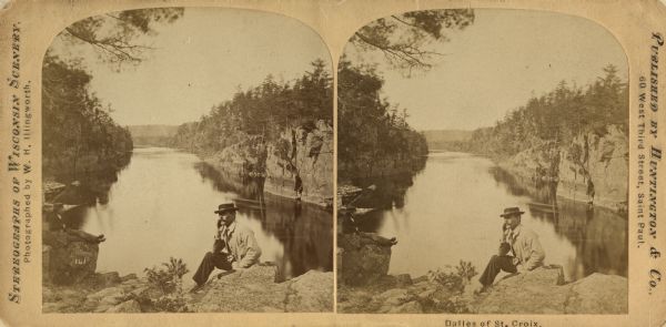 Stereograph of the Dalles and the Saint Croix River, with one man in the center foreground sitting posing on a rock and looking to the left. On the far left further down is another man reclining on a rock looking out to the right towards the river below.