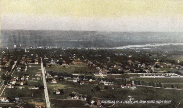 Elevated view of La Crosse. Caption reads: "Panorama of La Crosse, Wis. from Grand Dad's Bluff."