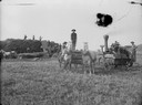 Men Working Tractor and Threshing Machine