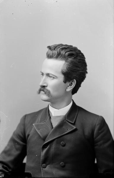 Waist-up portrait of Robert M. La Follette, Sr. at the age of 29 when elected to Congress in 1884.