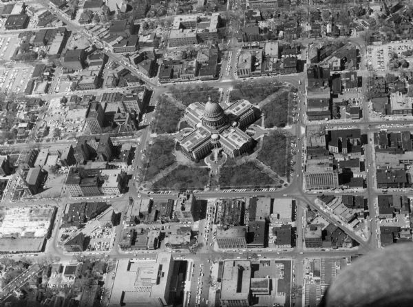 Aerial view of the Wisconsin State Capitol and surrounding area. The view is looking northwest, with King Street on the bottom right, and S. Hamilton Street on the bottom left.