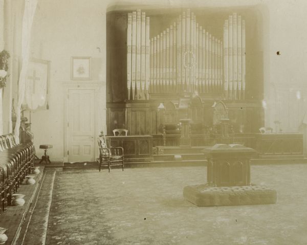 An interior view of the Masonic Temple, looking east through the Lodge room.