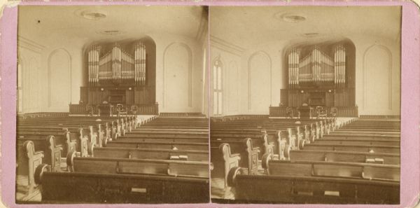 Stereograph of the organ inside of the Presbyterian church. This site is now occupied by the Masonic Temple.