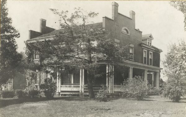 Exterior view of the residence of Mrs. M.S. Rowley on University Avenue, opposite the University of Wisconsin-Madison Chemistry building.