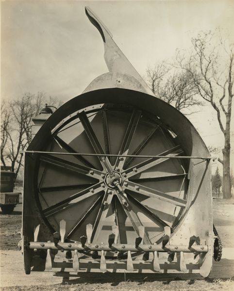 Front end view of a rotary snowplow used on mountain passes, manufactured by the Winther Motor and Truck Company.