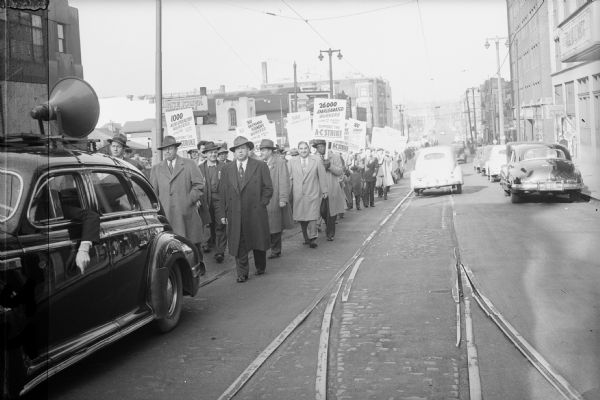 Striking Allis Chalmbers workers and CIO supporters on parade in 1946.  In later years it was common suggested that the Communist-dominated Milwaukee CIO had contributed to the election of Senator Joseph R. McCarthy because of their opposition to Senator Robert La Follette's anti-Communist stance.  This historical irony is now generally discounted by McCarthy biographers.