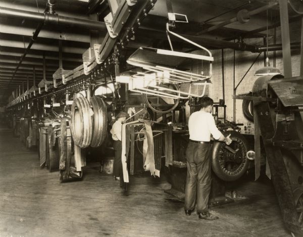 Rubber workers making tires at the Ajax Rubber Company plant in Racine.