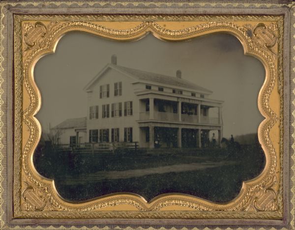 Ambrotype of the Wade House, a carriage inn located in Greenbush, also showing a section of the original plank road in the foreground.