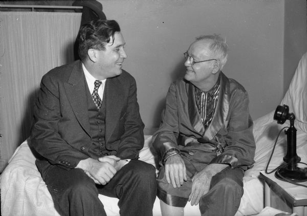 Wendell Willkie visits with Aaron Martin Brayton, retired editor of the <i>Wisconsin State Journal</i>, on his bed in a local hospital room during Willkie's 1944 campaign for the Republican Presidential nomination.