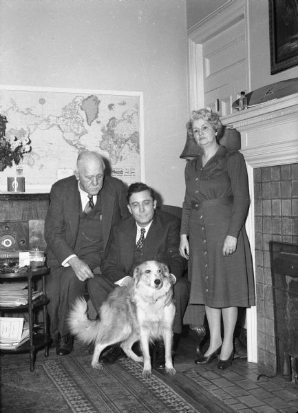 Wendell Willkie with the Governor and Mrs. Walter Goodland and their dog in the Governor's residence during Willkie's 1944 Presidential campaign visit to Wisconsin.