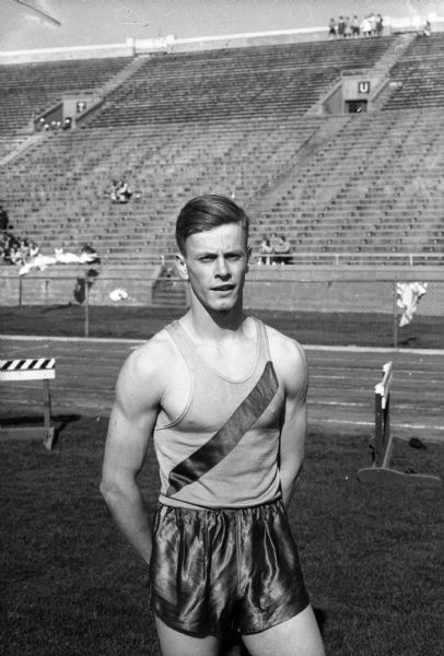 Dick Bauhs, West High School track star, whose best time in the 200-yard low hurdles has been 24.9 seconds, and has leaped 20 feet 1/2 inch in the broad jump.