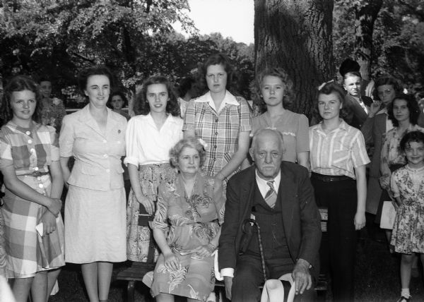 Group portrait of Governor and Mrs. Walter S. Goodland at the Junior Red Cross picnic with new and retiring officers. From left to right: Mrs. Gertrude Anderson, Ruth Mary Noland, Katherine Knaplund, Marion Miller, and Janice Richardson.