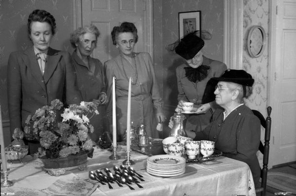 Five members of the Madison chapter of the Milwaukee-Downer Club at the birthday party for Miss Ellen Sabin, president emerita of Milwaukee-Downer College, from left: Mrs. Austin T. Breyer, 2730 Lakeland Avenue; Mrs. Ben H. Anderson, Maple Bluff; Mrs. Glenn Stephens, 1102 Sherman Avenue; Mrs. Harold S. Crosby, 2208 Rowley Avenue; and Miss Anna Haswell, Windsor.
