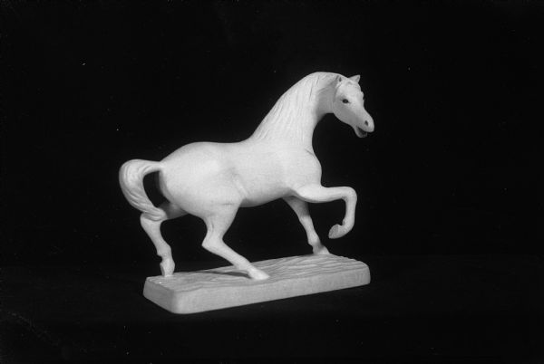 Wood carving of a stallion by Agnar Ole, Washburn, Wisconsin, one of the entries in the sixth Rural Art show at the University of Wisconsin Memorial Union.
