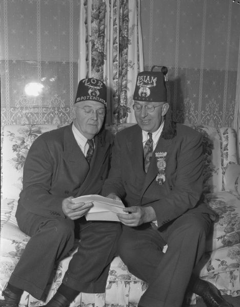 Portrait of two Shrine members, William H. Woodfield Jr., the Imperial Potentate of the Shrine of North America, and Melvin E. Diemer, Potentate of the Zor Temple.