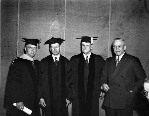University of Wisconsin Commencement honorary degree recipients with Governor Oscar Rennebohm and, left to right, President E.B. Fred, John Van Vleck, former University of Wisconsin professor, and George Haight, Chicago lawyer and president of the Wisconsin Alumnae Research Foundation.