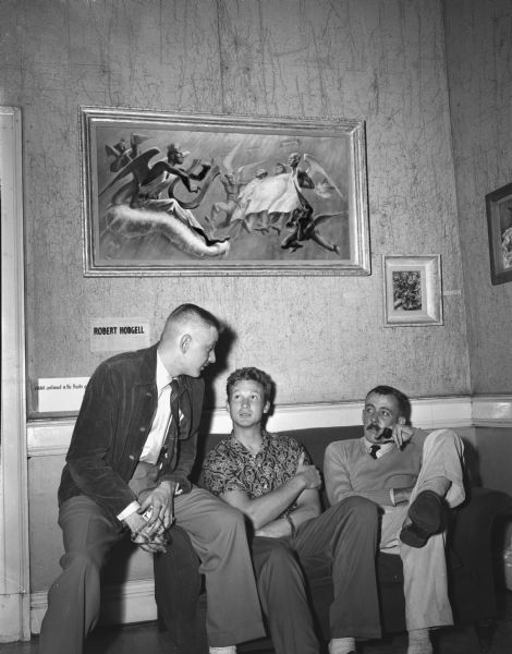 Memorial Union Art Show Graduate art students left to right: James Storey, Robert Overman Hodgell, and John Wilde, all University of Wisconsin graduate art students, display their work at the Memorial Union in the "Experiment in Art" show.