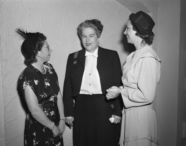 Three Madison alumnae of Milwaukee-Downer College at a luncheon at the University Club. Shown chatting together are, from left to right: Mrs. Arno T. (Vera) Lenz; Miss Esther Easton, home economist at Oscar Mayer and Co. and luncheon principal speaker; Mrs. Reuben (Nettie B.) Sy.
