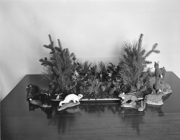 Seven examples of plaster models of animals made by marine recruiting officer Lewis McKerley of Florence County on display at the governor's residence. He makes the life-like scale models at the Tilimac Handicrafts plant on the Albert Laron farm in the town of Homestead, Florence County.