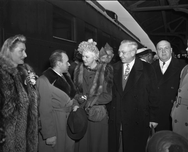 French representatives arrived in Madison aboard the French Gratitude Train (Merci Train) and were welcomed at the Northwestern Depot by the governor and his wife. Shown, left to right, are: Mme. Olga LeMonnyer; M. Jacques LeMonnyer, French vice consul from Chicago; Mrs. Mary Rennebohm; Governor Oscar Rennebohm and President E.B. Fred of the University of Wisconsin. The train was composed of 49 cars, each bearing gifts for one of the United States plus one car with gifts to be divided between Hawaii and Alaska, which had not yet been granted statehood.