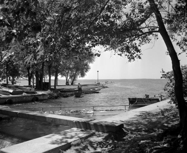 Tenney Park breakwater and Lake Mendota. The city of Madison was able to resume construction at no cost. The construction company tearing up East Washington Avenue hauled its rubble to Tenney Park to create 300 feet of breakwater.