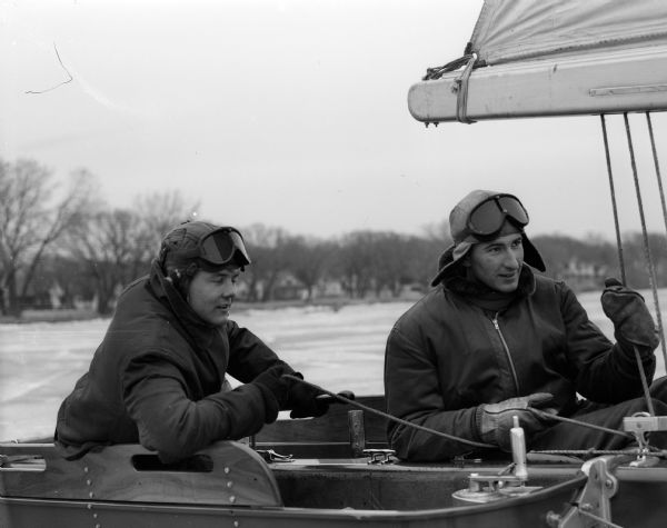 Two iceboaters race their iceboat during the Hearst Trophy Iceboat Race on Lake Monona. Bill Mattison is the man on the right.