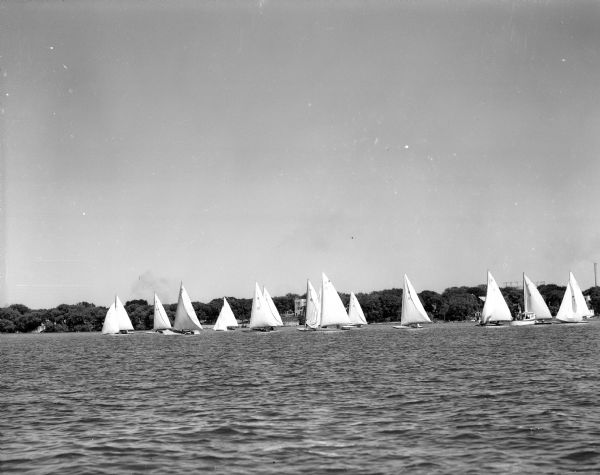 Class C and E sailboats sailing on Lake Mendota as the Mendota Yacht Club of Madison hosts the Inland Lakes Regatta.