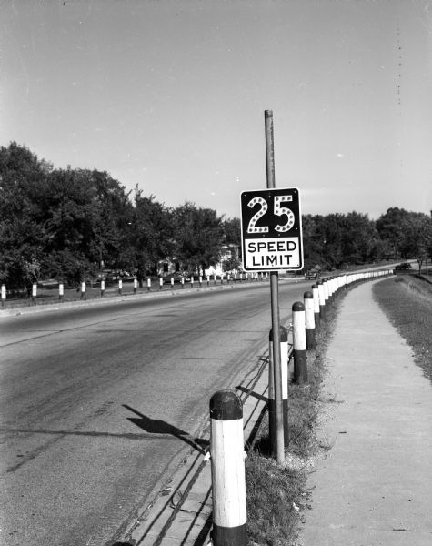 A highway speed limit sign on Olin Avenue in Madison displays the urban speed limit of 25 miles per hour prior to leaving the Madison city limits.