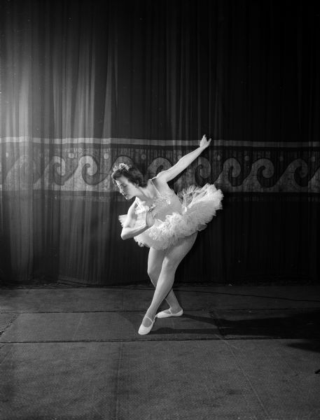 Elaine Tripalin, trained at the Kathryn Hubbard School, is shown dancing the role of the 'Sugar Plum Fairy' in 'The Nutcracker' ballet at the Masonic auditorium.