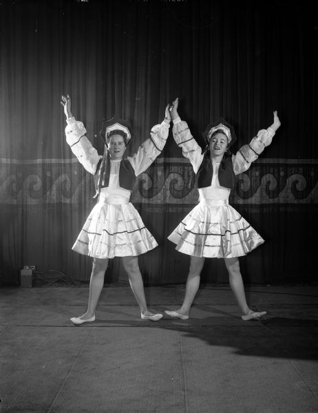 Susie Burns and Judy Berger dance the roles of the Russian dancers in 'Trepak' in 'The Nutcracker' on stage at the Masonic auditorium.