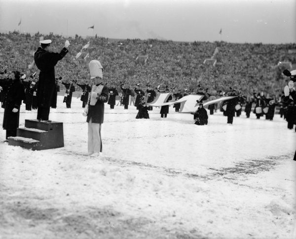 Wisconsin vs. Indiana Football Game The UW marching band performs in the snow during half time at the Wisconsin vs. Indiana football game.