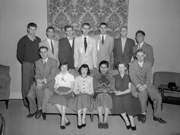 Youth advisory board, a part of the Governor's Commission on Human Rights. Standing, left to right, are: David Willette, Chippewa Falls; Richard Rosenweig, Appleton; Larry Durning, Waupun; William Schmidt, Oshkosh; John Walker, Lancaster; Jack Buss, Marshfield; and Frank Wong, Beloit. Seated, left to right, are: Donald Schmitt, Madison; Shirley Arnold, Loretta; Cecilia Beitz, LaCrosse; Ada Deer, Keshena; Karen Kritz, Spring Green; and Tom Mase, Rhinelander. Not in the picture is Carl Ray Witherspoon, Rhinelander.