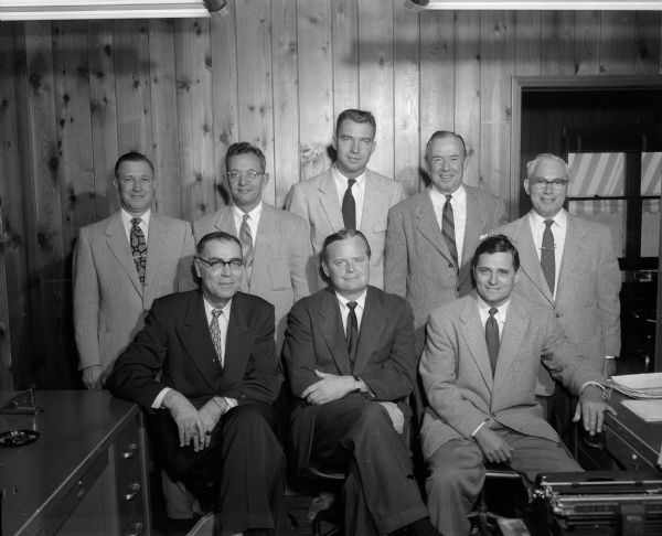 "Officers and directors of the recently organized Shorewood Corners Association are shown.  They are (left to right) front row- T.L. Graham, vice-president; Lawrence J. Fitzpatrick, president, and Chet Bible, secretary-treasurer; and back row- Wesley West, Sam Jacobson, David Wilson Jr., and Julius Giller, all members of the board of directors.  Composed of Shorewood Corners business  men, the association was organized to promote merchandising efforts and the area."
Lawrence J. Fitzpatrick,President of J.J. Fitzpatrick Lumber Co.
T.L. Graham, owner Graham's Books & Stationery
Chester Bible, owner Madison Mobile Homes.