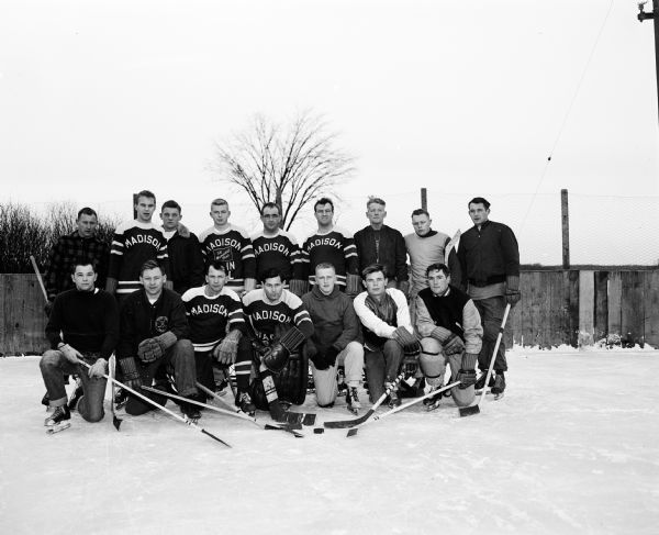Group [ortrait of the Madison Cardinal Hockey Team with their manager and coach. The team, part of the Fox Valley Hockey League, plays its home game at the Vilas Park rink.
