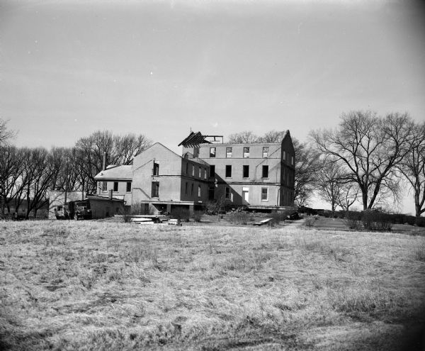 Front view of the Dane County Home (also known as the "poor house" or "poor farm") is pictured as it is being torn down. It was built in 1855 and located on county owned land south of Highway 18-151.