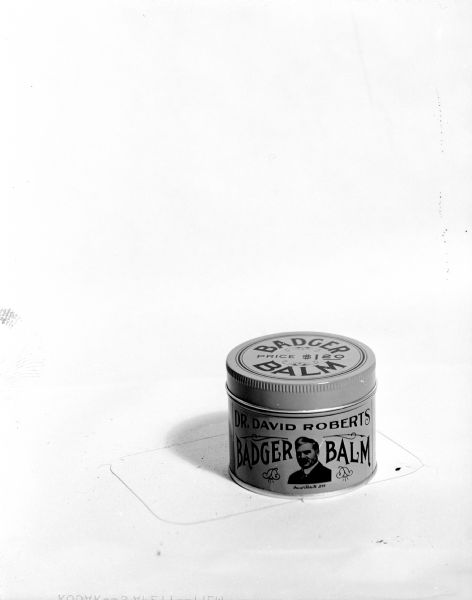 Studio photograph of Dr. David Roberts Badger Balm.  Dr. Roberts (1866-1951) was a Waukesha veterinarian. In 1904, he incorporated the Dr. David Robert's Veterinary Company to produce animal medicines and sold them throughout the United States. He was the State Veterinarian from 1906-1908 and he also published a book called "Practical Home Veterinarian."